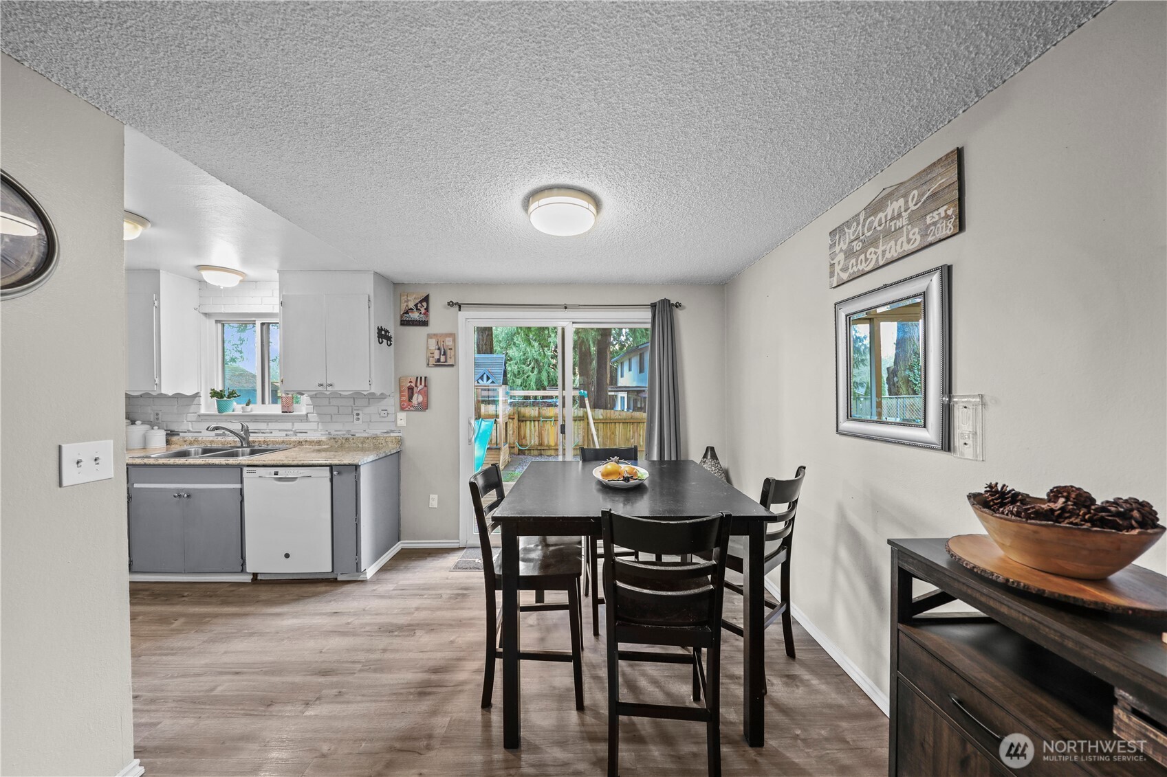203 South 357th Street Federal Way, WA 98003 - Photo 9 of 28 a view of a dining room with furniture and window