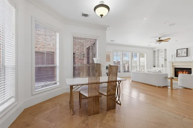 a view of a livingroom with furniture and a window
