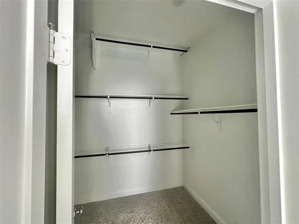 a white refrigerator freezer and a white kitchen