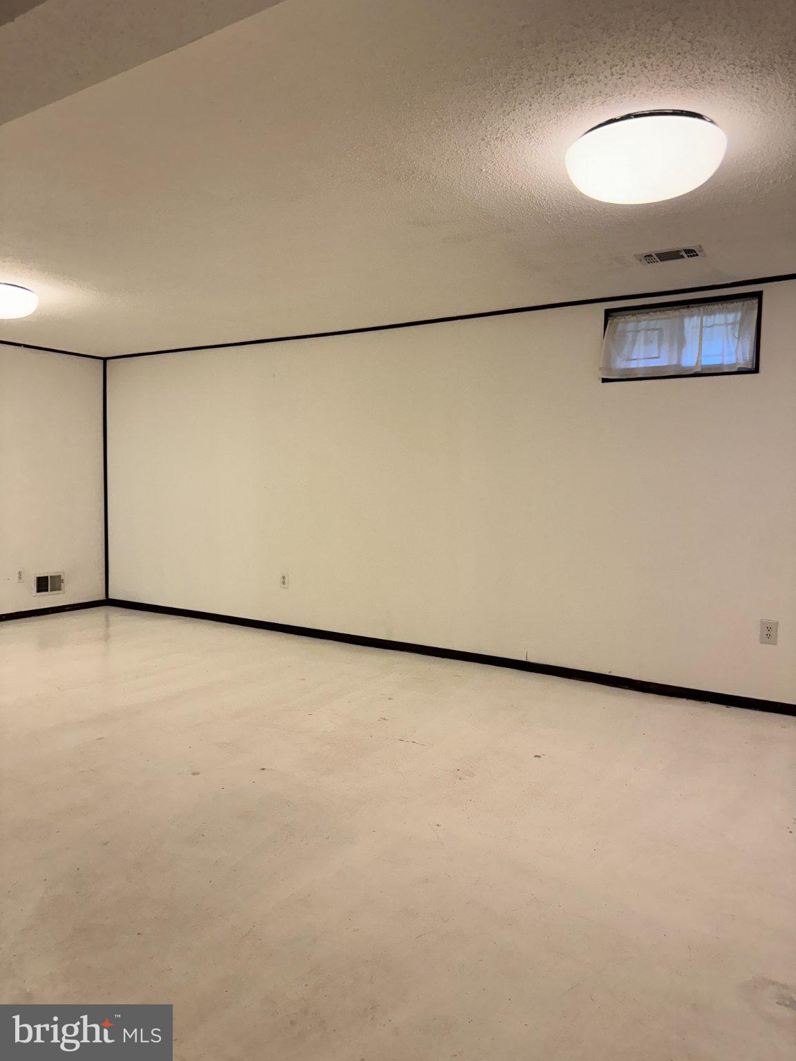 8336 Scotts Level Road Baltimore, MD 21208 - Photo 39 of 55 Spacious, versatile blank canvas room.