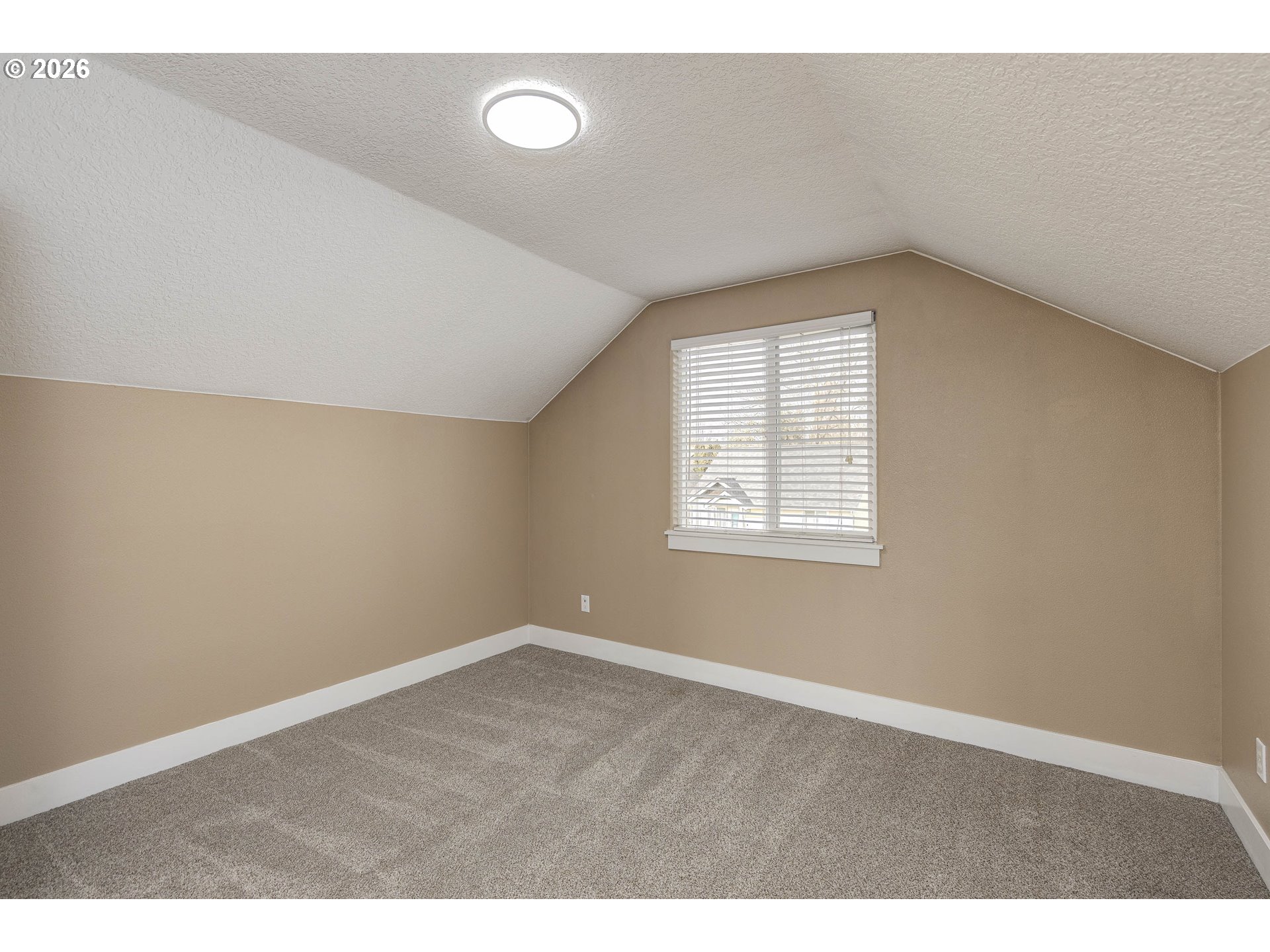 601 West 1st Street, Unit 13 Newberg, OR 97132 - Photo 21 of 30 a view of an empty room with a window