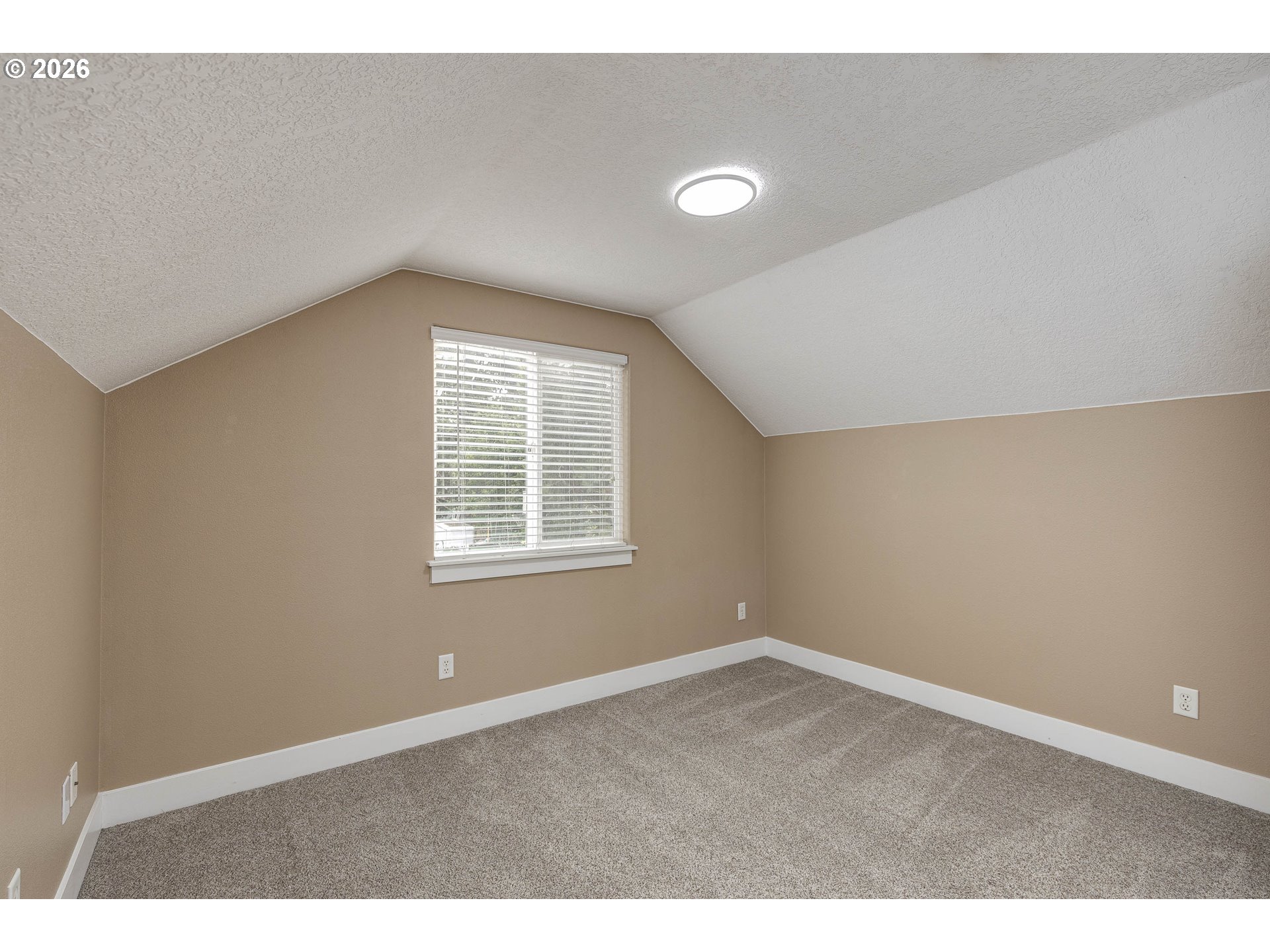 601 West 1st Street, Unit 13 Newberg, OR 97132 - Photo 23 of 30 an empty room with a window