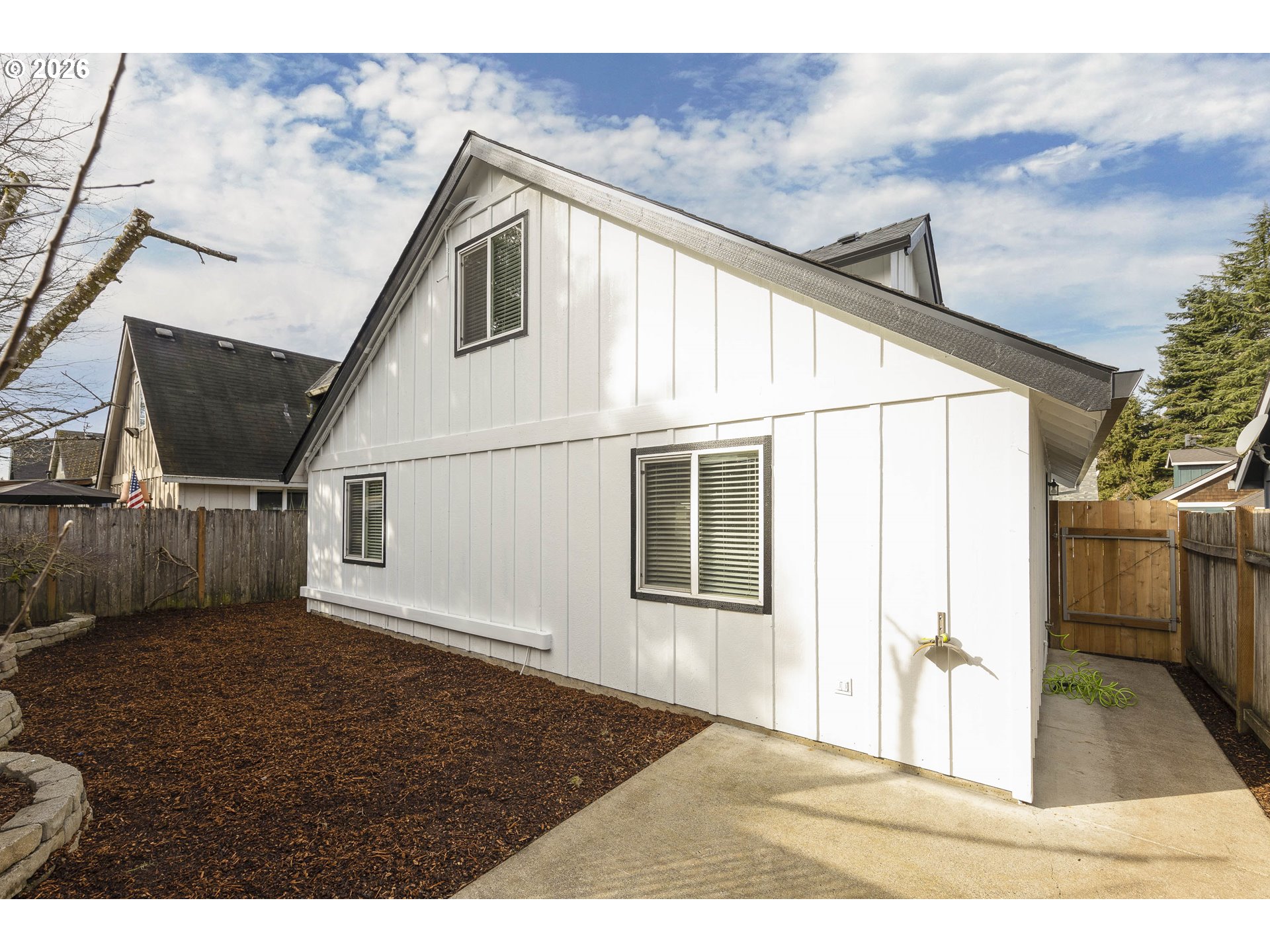 601 West 1st Street, Unit 13 Newberg, OR 97132 - Photo 27 of 30 a house view with a outdoor space