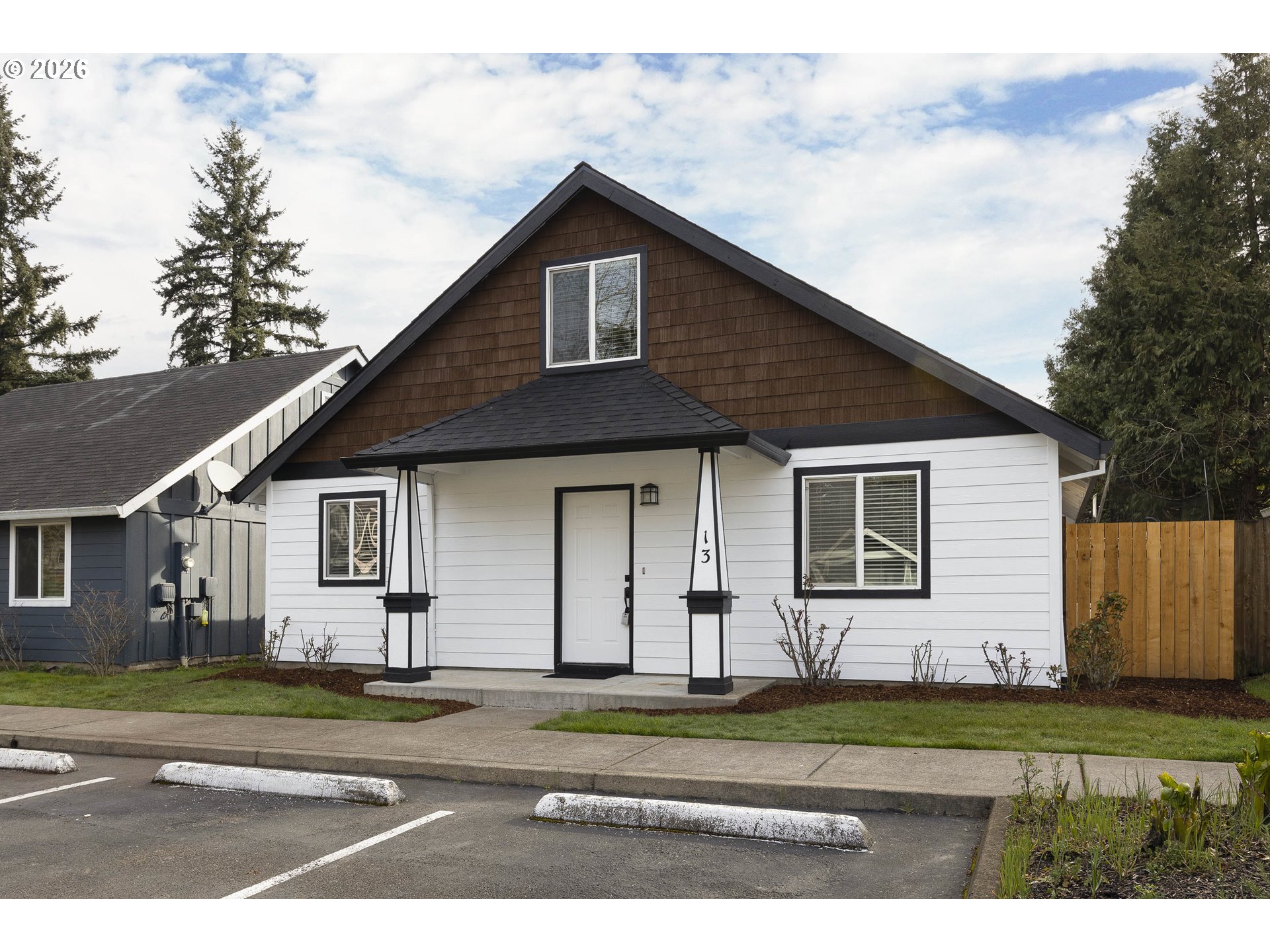 601 West 1st Street, Unit 13 Newberg, OR 97132 - Photo 28 of 30 a front view of a house with a yard