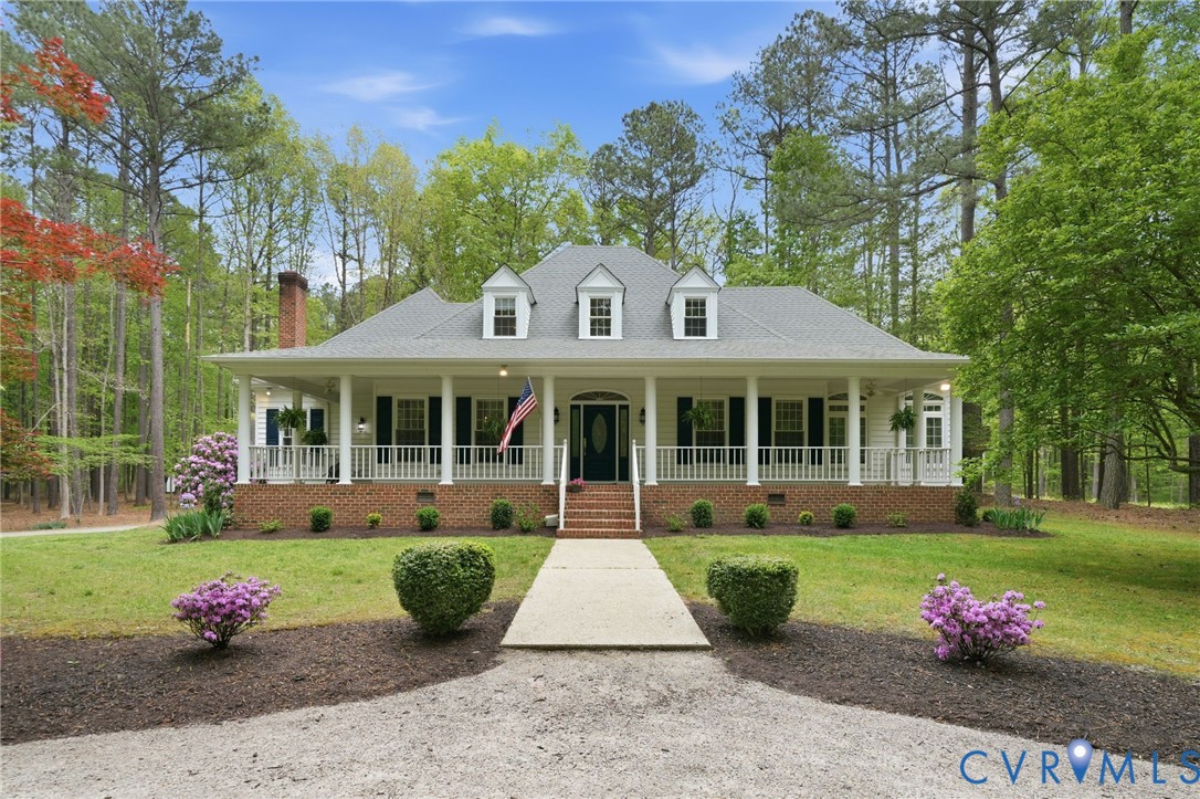 10424 Windam Hill Road Glen Allen, VA 23059 - Photo 1 of 69 a front view of a house with garden