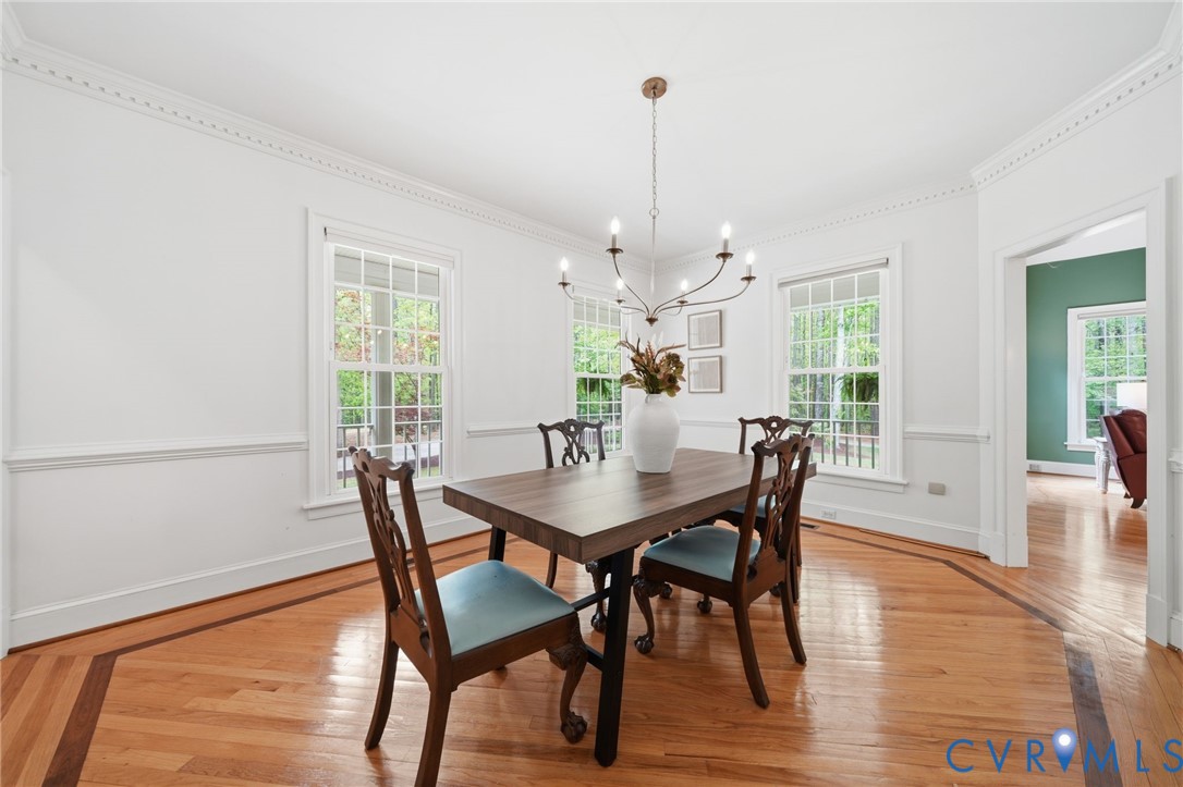 10424 Windam Hill Road Glen Allen, VA 23059 - Photo 12 of 69 a view of a dining room with furniture window and wooden floor