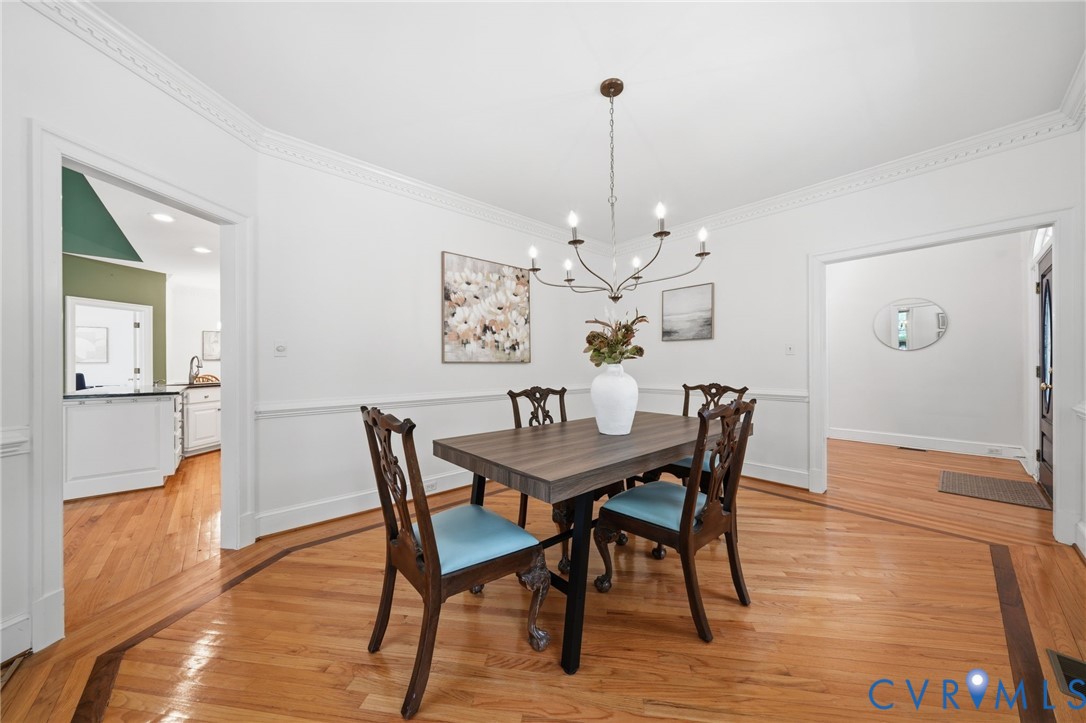 10424 Windam Hill Road Glen Allen, VA 23059 - Photo 13 of 69 a view of a dining room with furniture wooden floor and chandelier