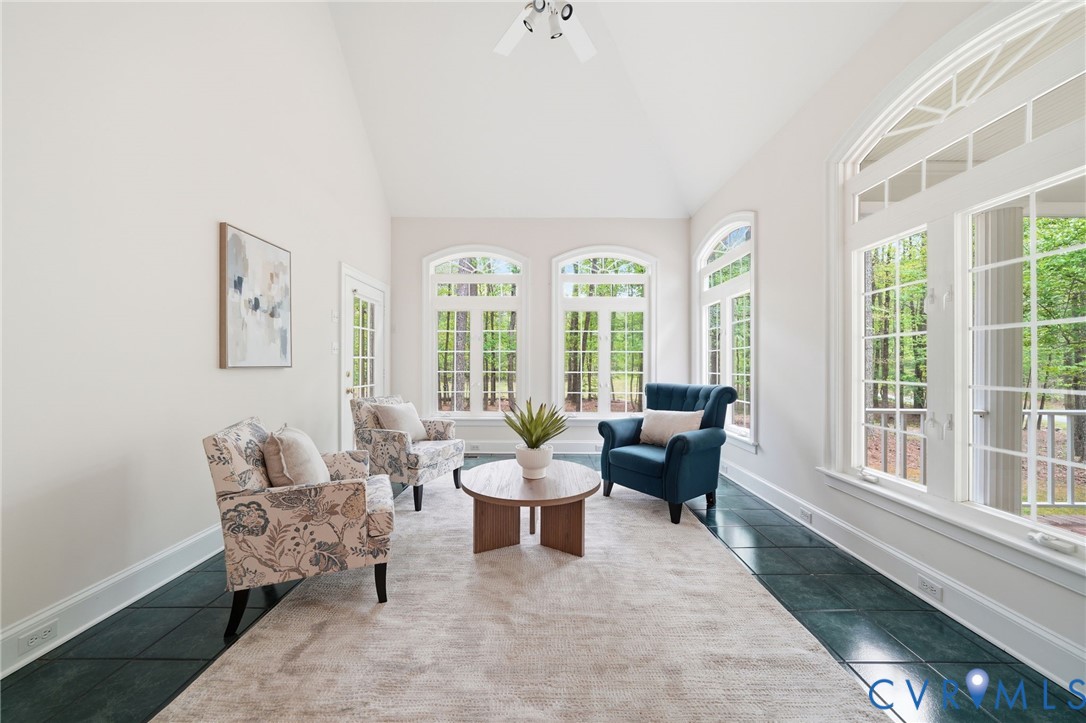 10424 Windam Hill Road Glen Allen, VA 23059 - Photo 18 of 69 a living room with furniture and floor to ceiling windows