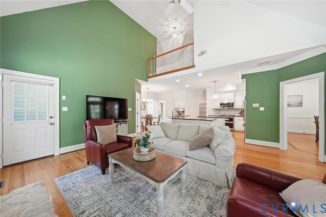 10424 Windam Hill Road Glen Allen, VA 23059 - Photo 26 of 69 a living room with furniture and a wooden floor