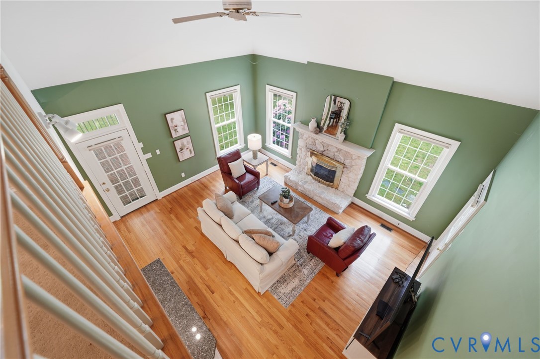 10424 Windam Hill Road Glen Allen, VA 23059 - Photo 32 of 69 Spacious living area featuring a stone fireplace,