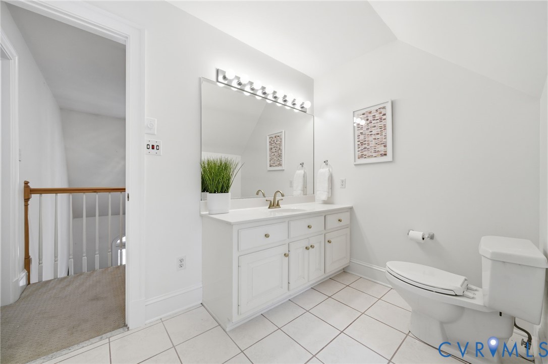 10424 Windam Hill Road Glen Allen, VA 23059 - Photo 34 of 69 a spacious bathroom with a double vanity sink mirror and toilet