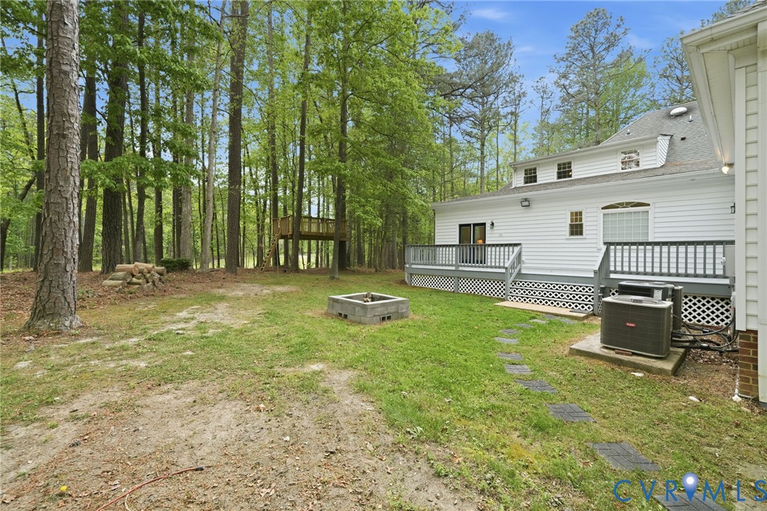10424 Windam Hill Road Glen Allen, VA 23059 - Photo 47 of 69 a swimming pool with outdoor seating and yard