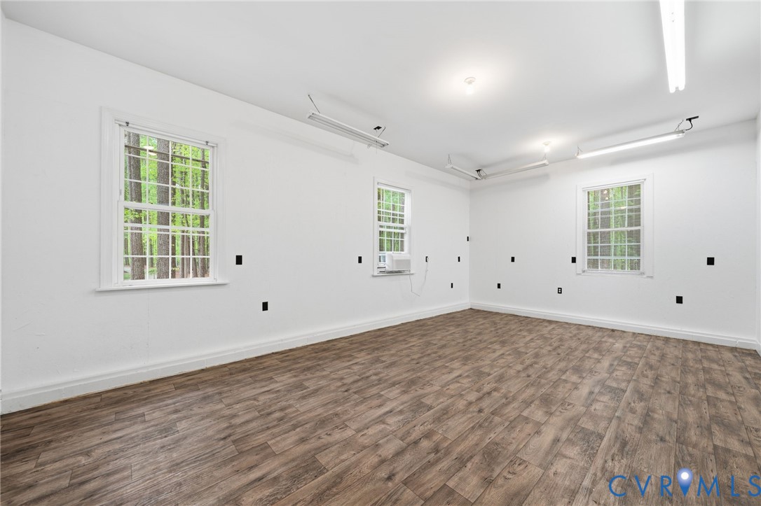 10424 Windam Hill Road Glen Allen, VA 23059 - Photo 55 of 69 a view of empty room with wooden floor and fan