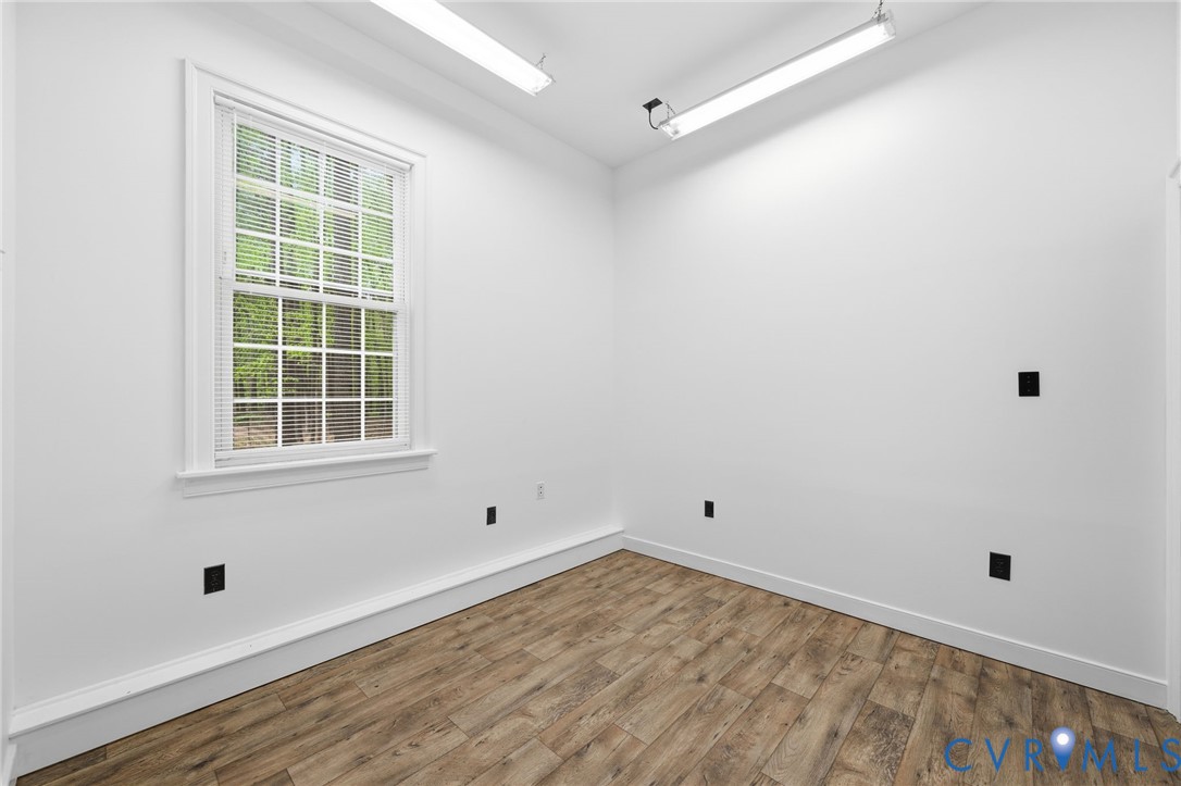 10424 Windam Hill Road Glen Allen, VA 23059 - Photo 56 of 69 a view of empty room with wooden floor and fan