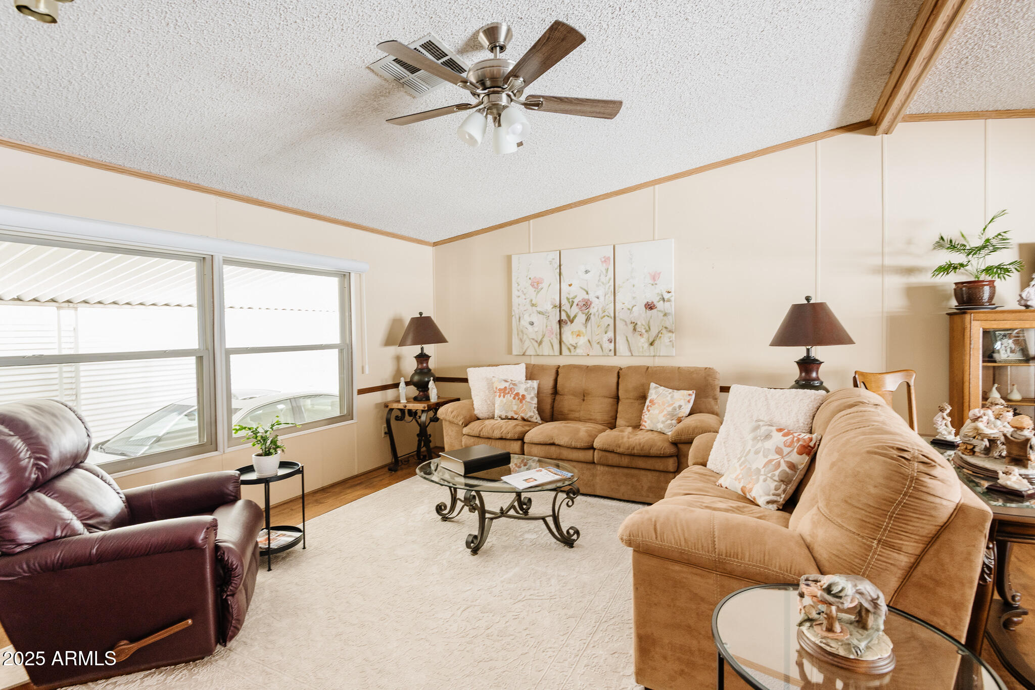 6770 West State Rte 89A, Unit 41 Sedona, AZ 86336 - Photo 12 of 31 a living room with furniture and a large window