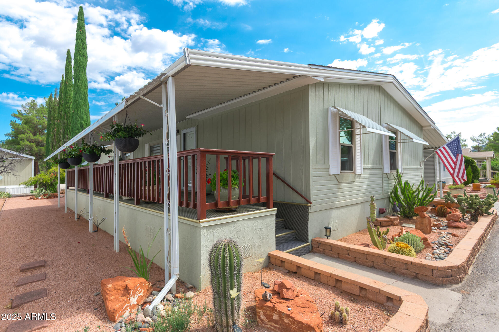 6770 West State Rte 89A, Unit 41 Sedona, AZ 86336 - Photo 2 of 31 a view of entryway with flower pots