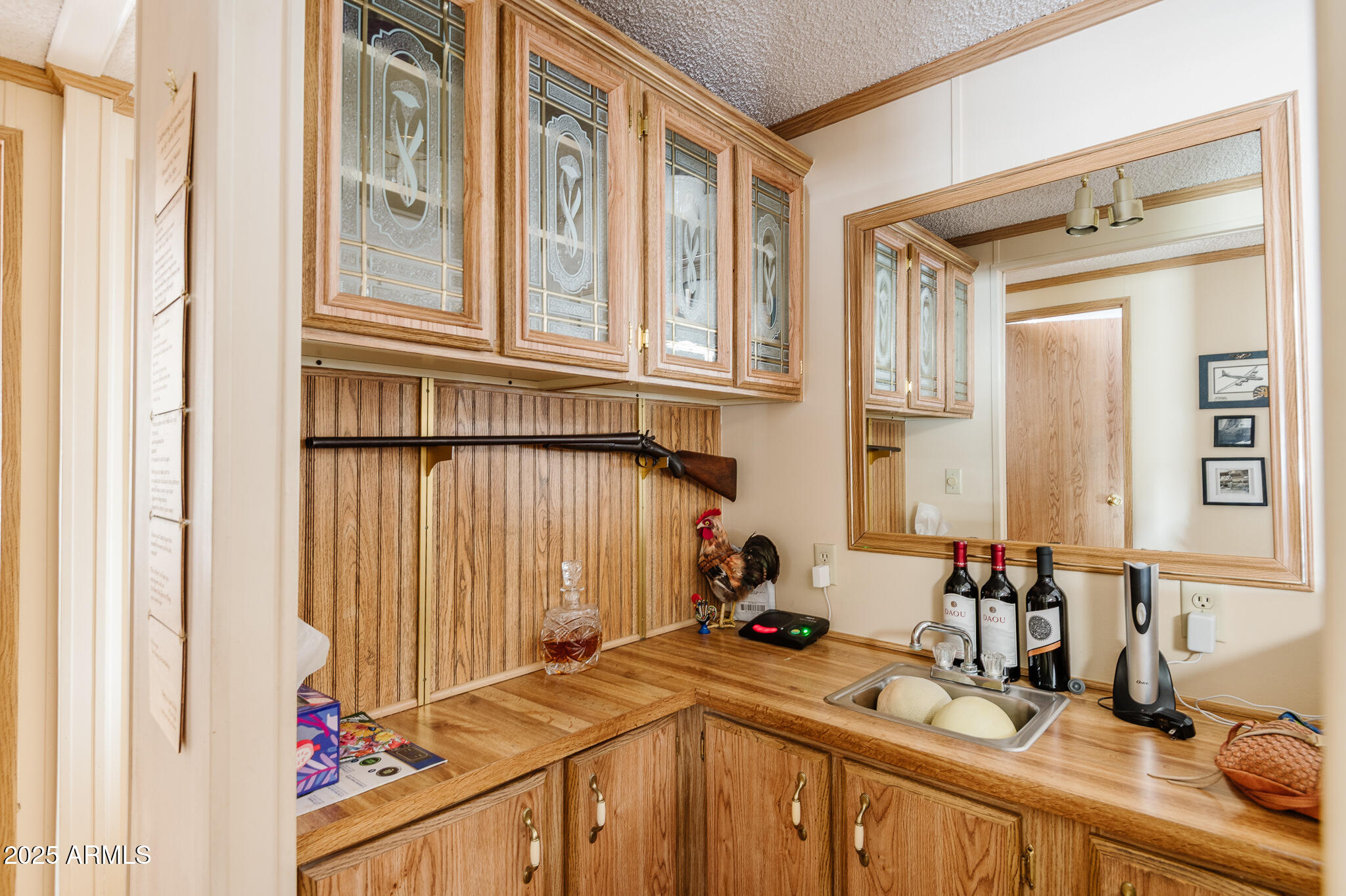 6770 West State Rte 89A, Unit 41 Sedona, AZ 86336 - Photo 25 of 31 a view of a kitchen with a sink and cabinets