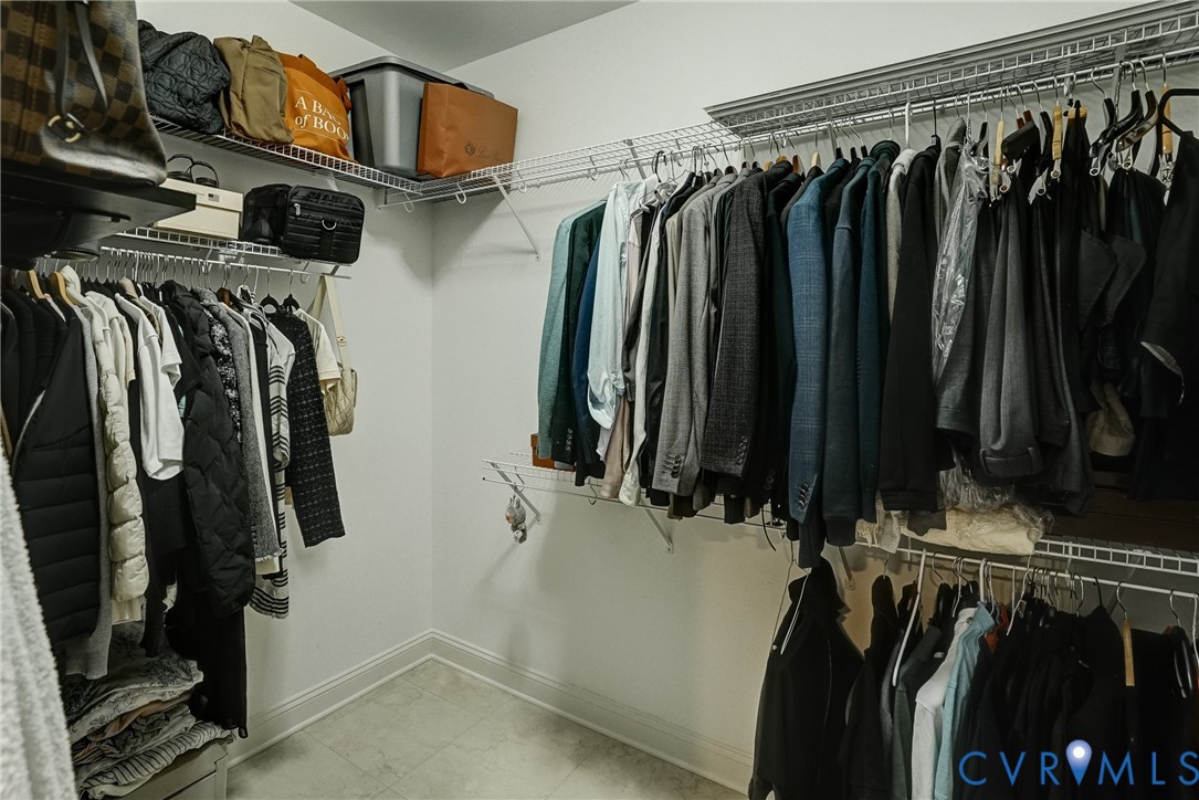 11600 Park Branch Lane Chesterfield, VA 23838 - Photo 27 of 47 a view of walk in closet with clothes and shoes