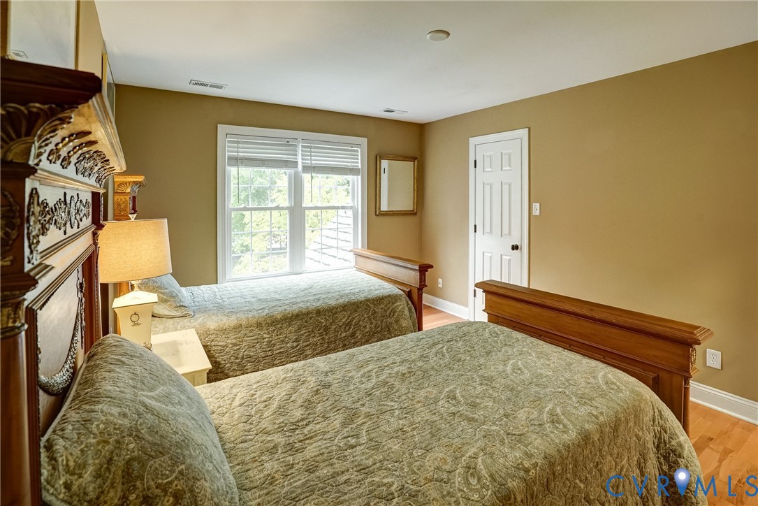 11600 Park Branch Lane Chesterfield, VA 23838 - Photo 30 of 47 a bedroom with a bed and a window