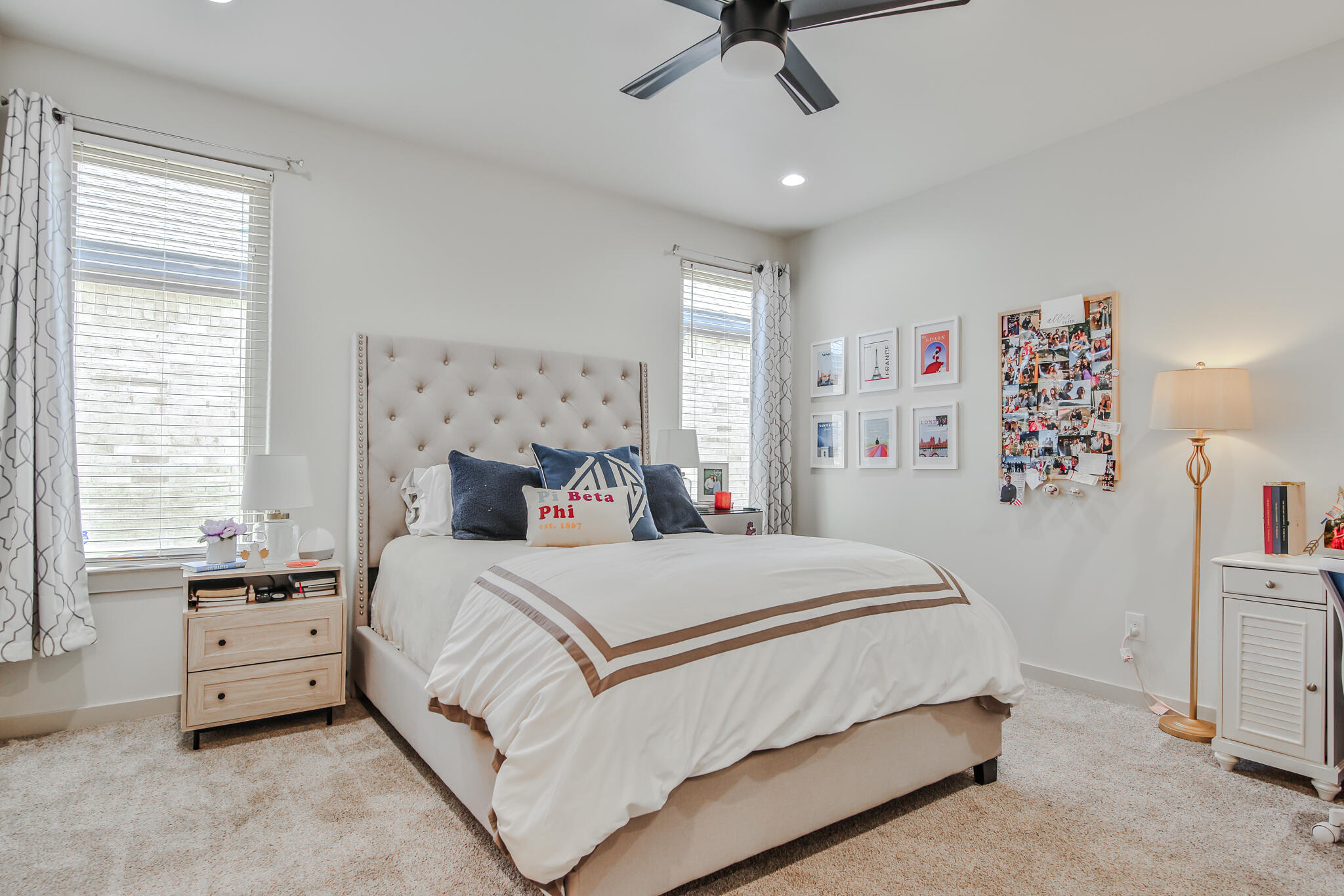 3806 59th Street Lubbock, TX 79413 - Photo 16 of 38 a bedroom with a bed and a chandelier