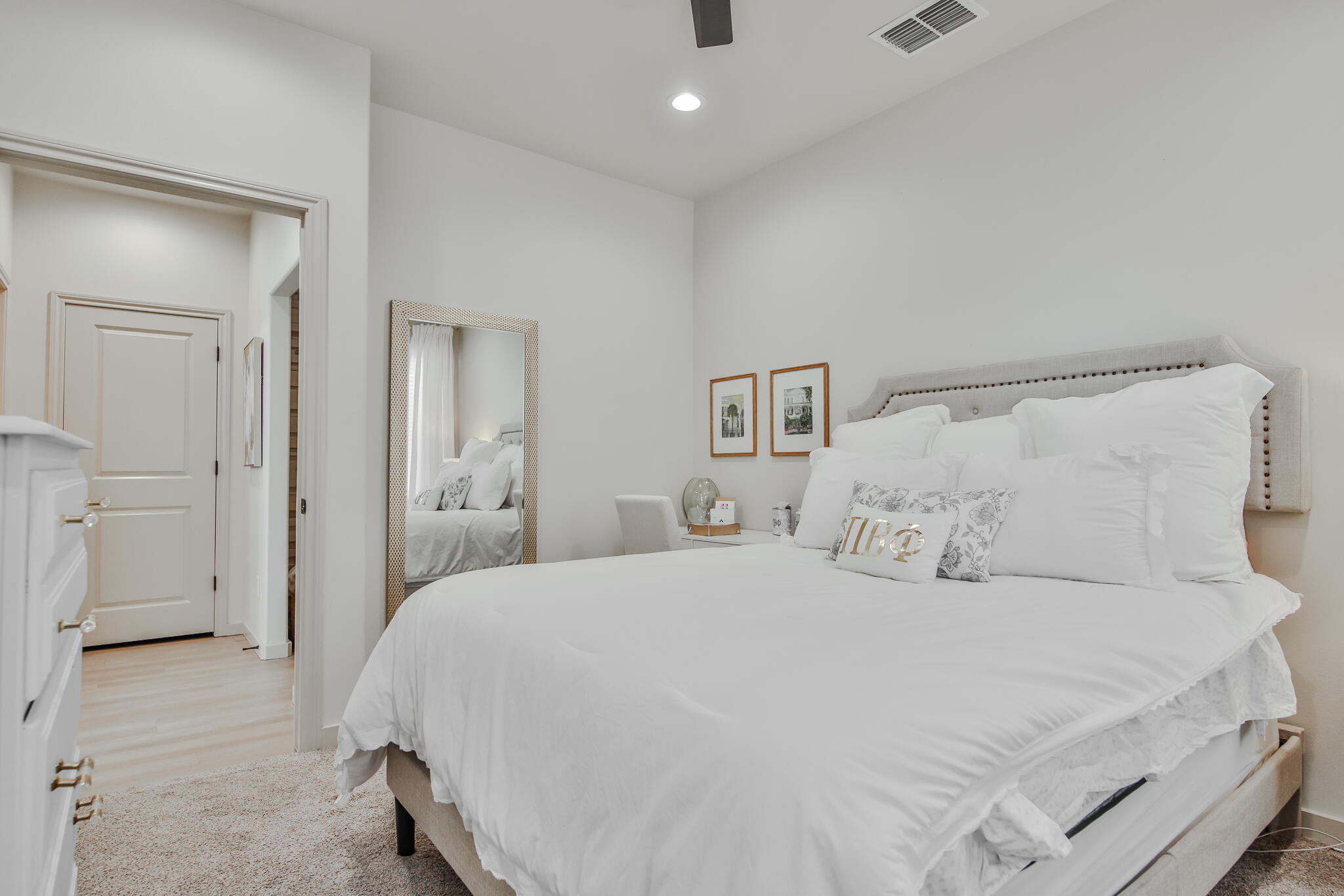 3806 59th Street Lubbock, TX 79413 - Photo 26 of 38 a bedroom with a bed and a walk in closet