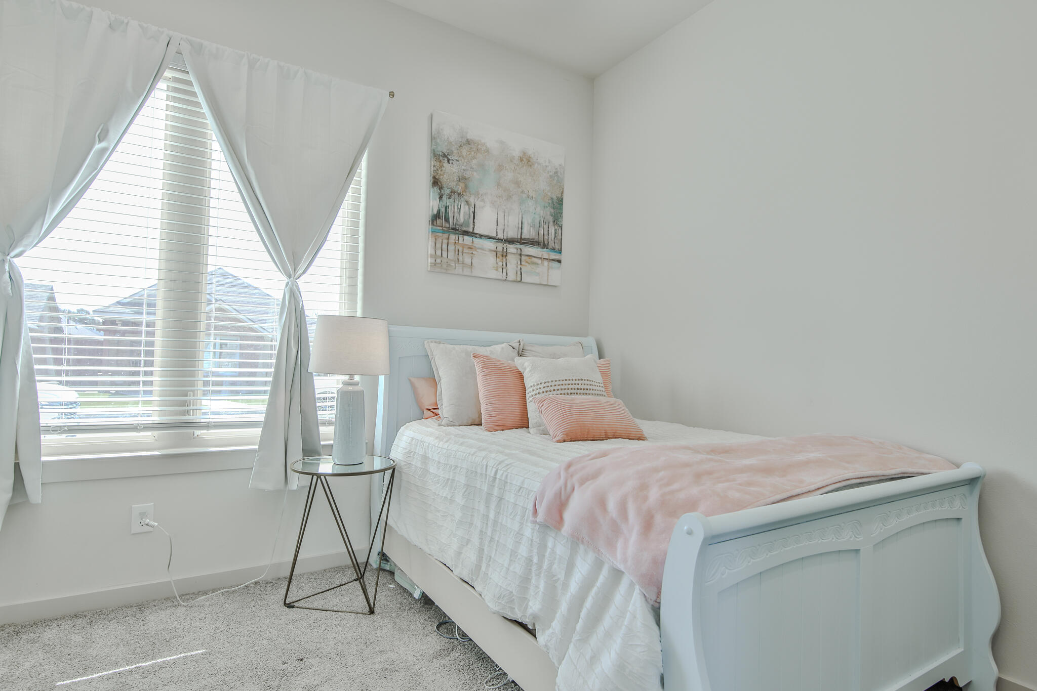 3806 59th Street Lubbock, TX 79413 - Photo 27 of 38 a bedroom with a bed and a window