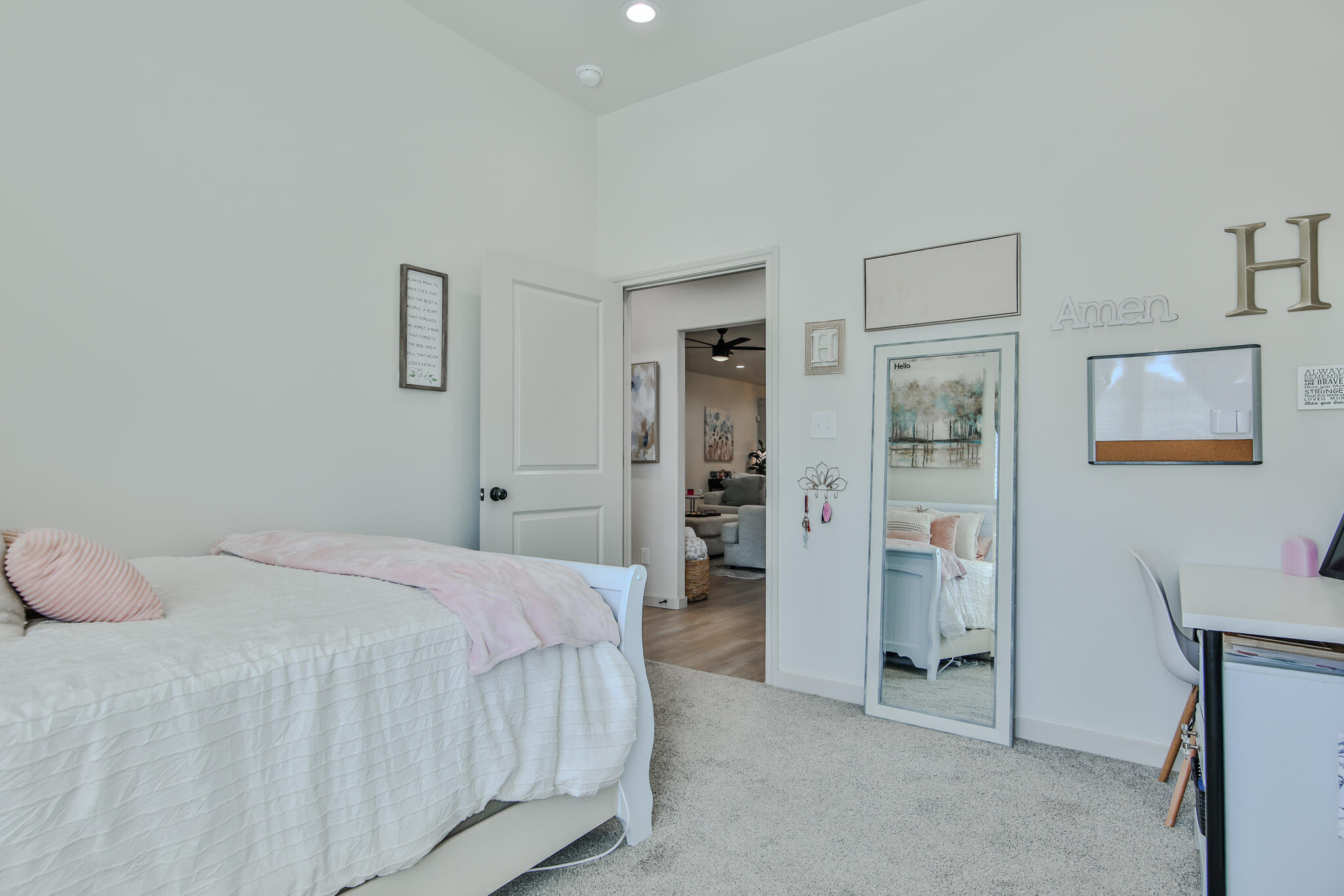 3806 59th Street Lubbock, TX 79413 - Photo 29 of 38 a bedroom with a bed and a cabinets