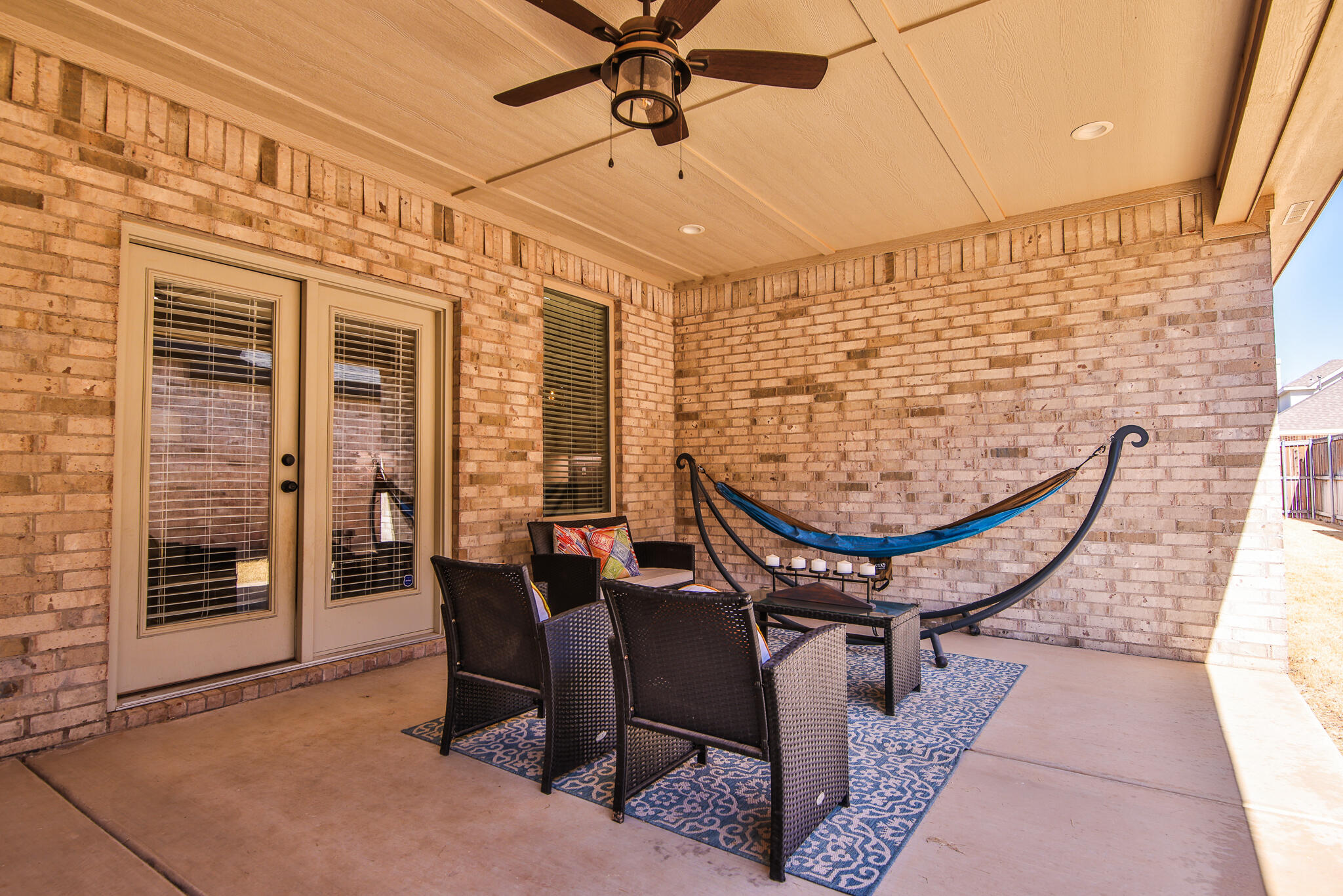 3806 59th Street Lubbock, TX 79413 - Photo 37 of 38 a view of a chairs and table in the patio
