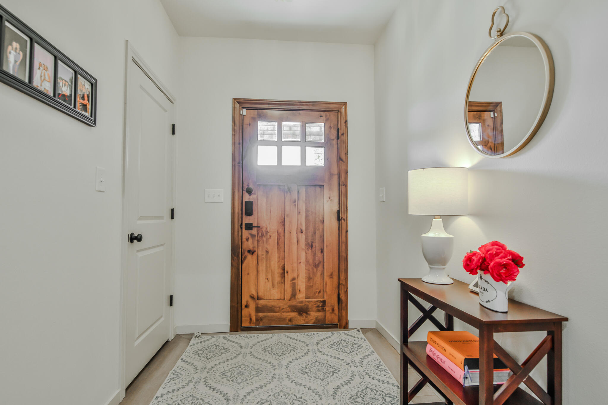 3806 59th Street Lubbock, TX 79413 - Photo 6 of 38 a view of an entryway with wooden floor