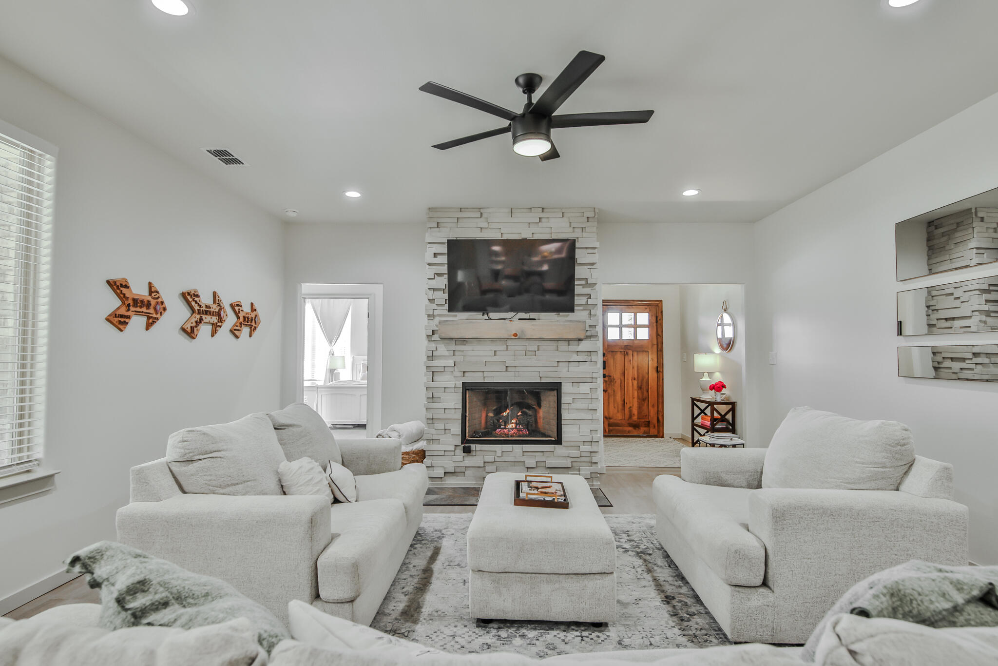3806 59th Street Lubbock, TX 79413 - Photo 8 of 38 a living room with furniture a fireplace