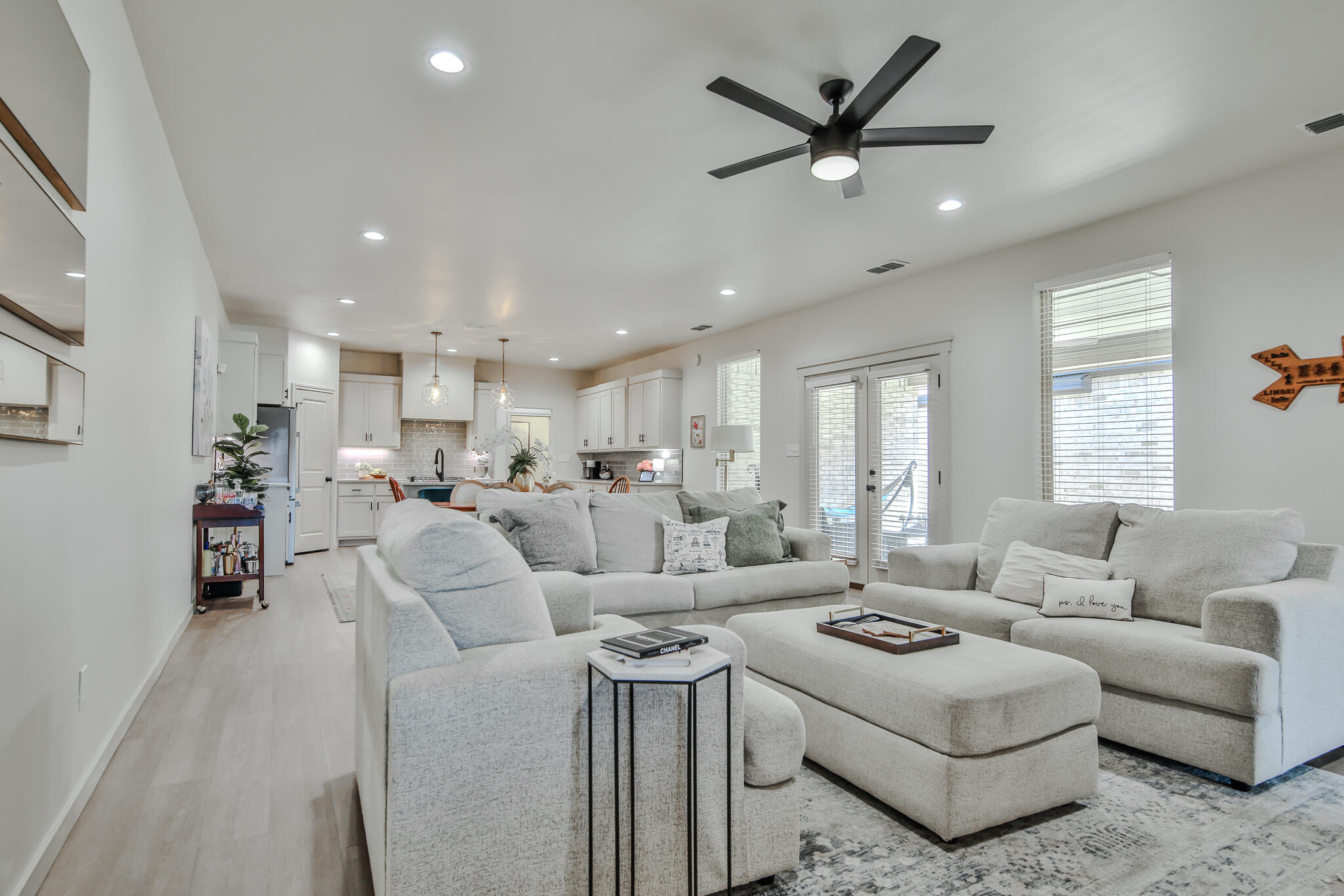 3806 59th Street Lubbock, TX 79413 - Photo 9 of 38 a living room with furniture kitchen view and a window