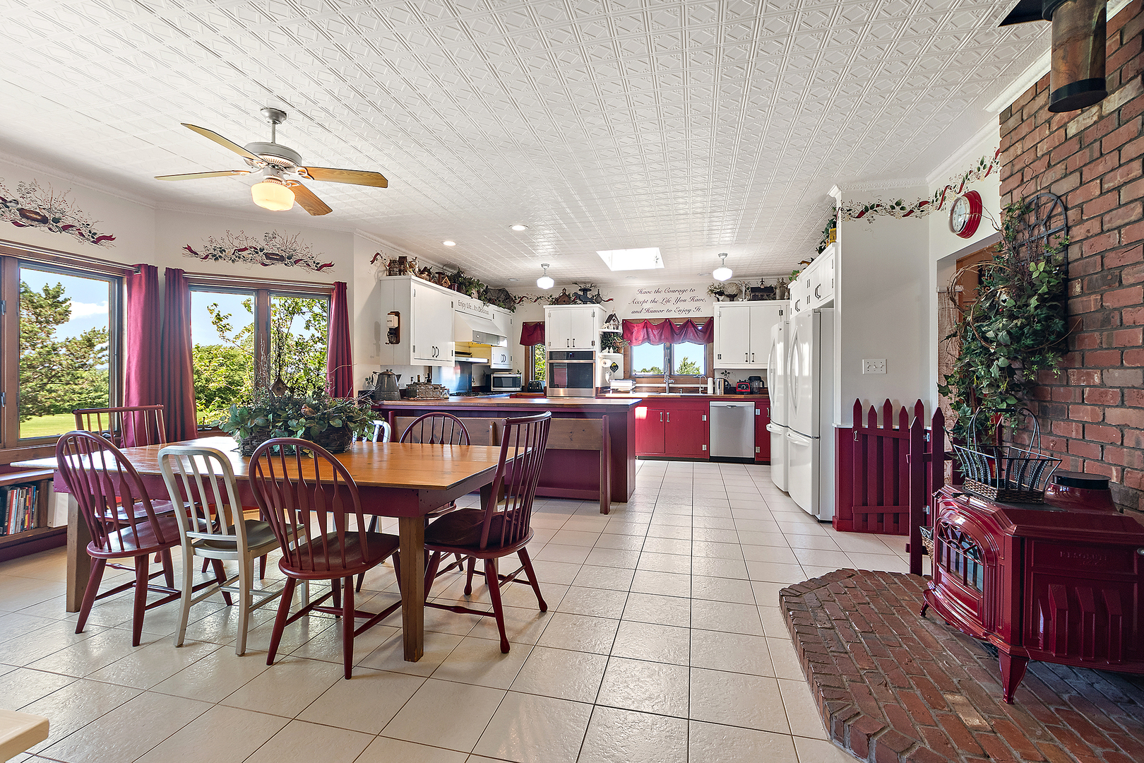 7860 West Steger Road Frankfort, IL 60423 - Photo 18 of 56 a dining hall with lots of furniture a chandelier and a view of kitchen