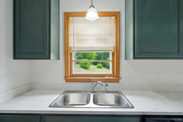 a kitchen with a stove and a microwave