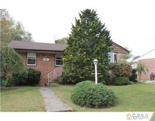 4 Gurley Road Edison, NJ 08817 - Photo 1 of 7 a house view with a backyard