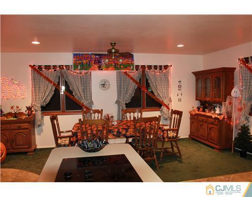 4 Gurley Road Edison, NJ 08817 - Photo 4 of 7 a view of a chairs and table in a patio