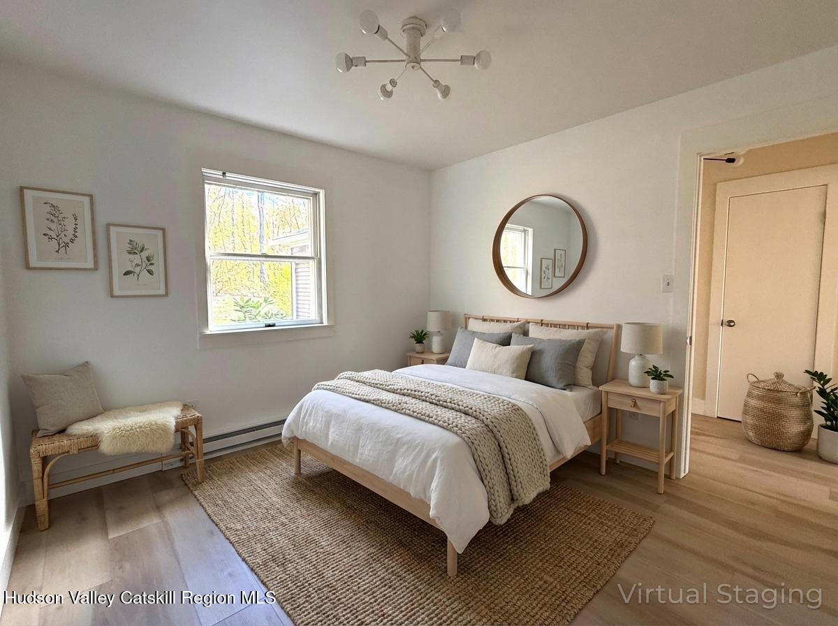 5265 County Rt 9g Germantown, NY 12526 - Photo 13 of 35 a bedroom with a bed mirror and a window
