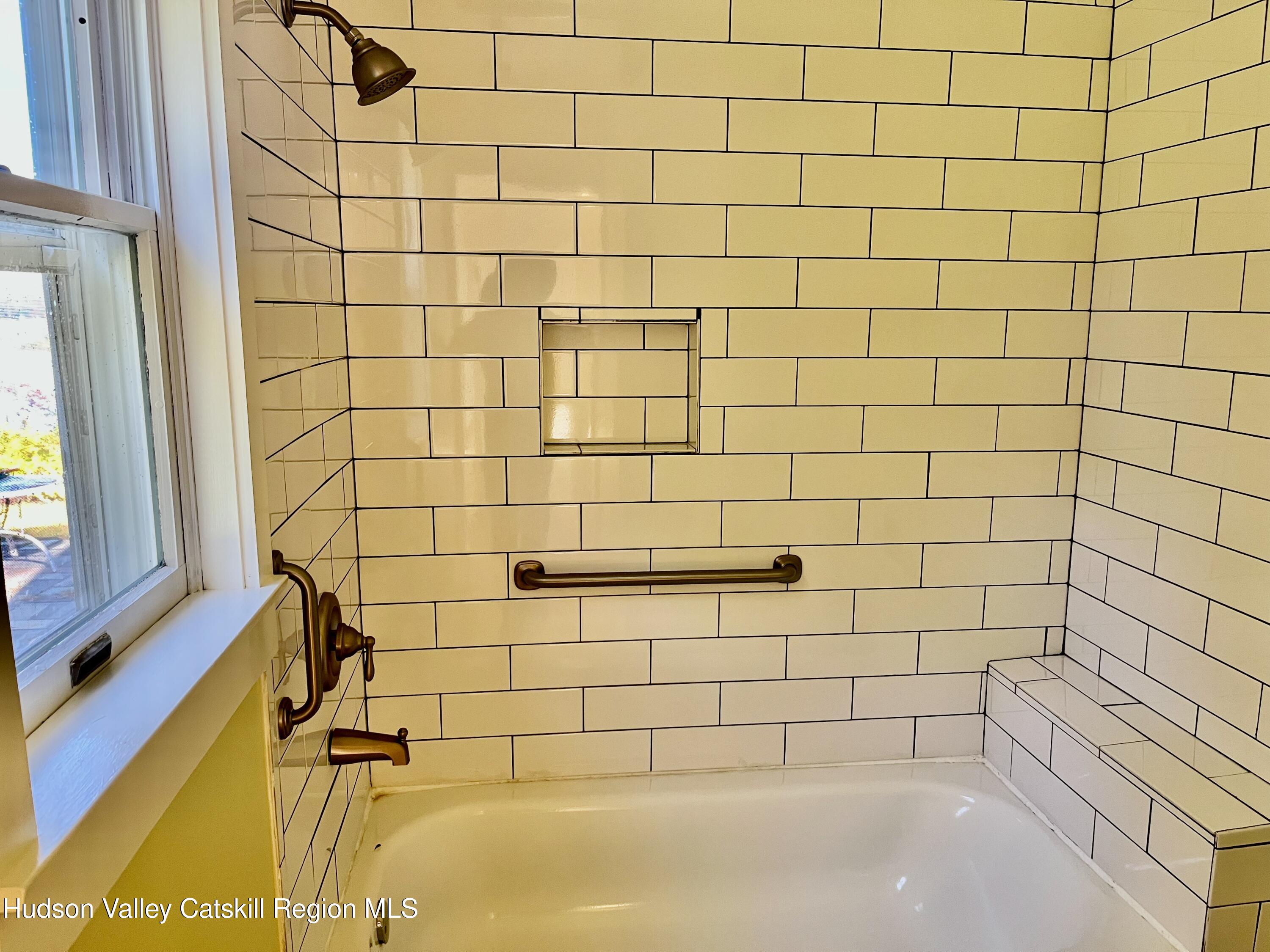 5265 County Rt 9g Germantown, NY 12526 - Photo 25 of 35 a bathroom with a bathtub and a shower