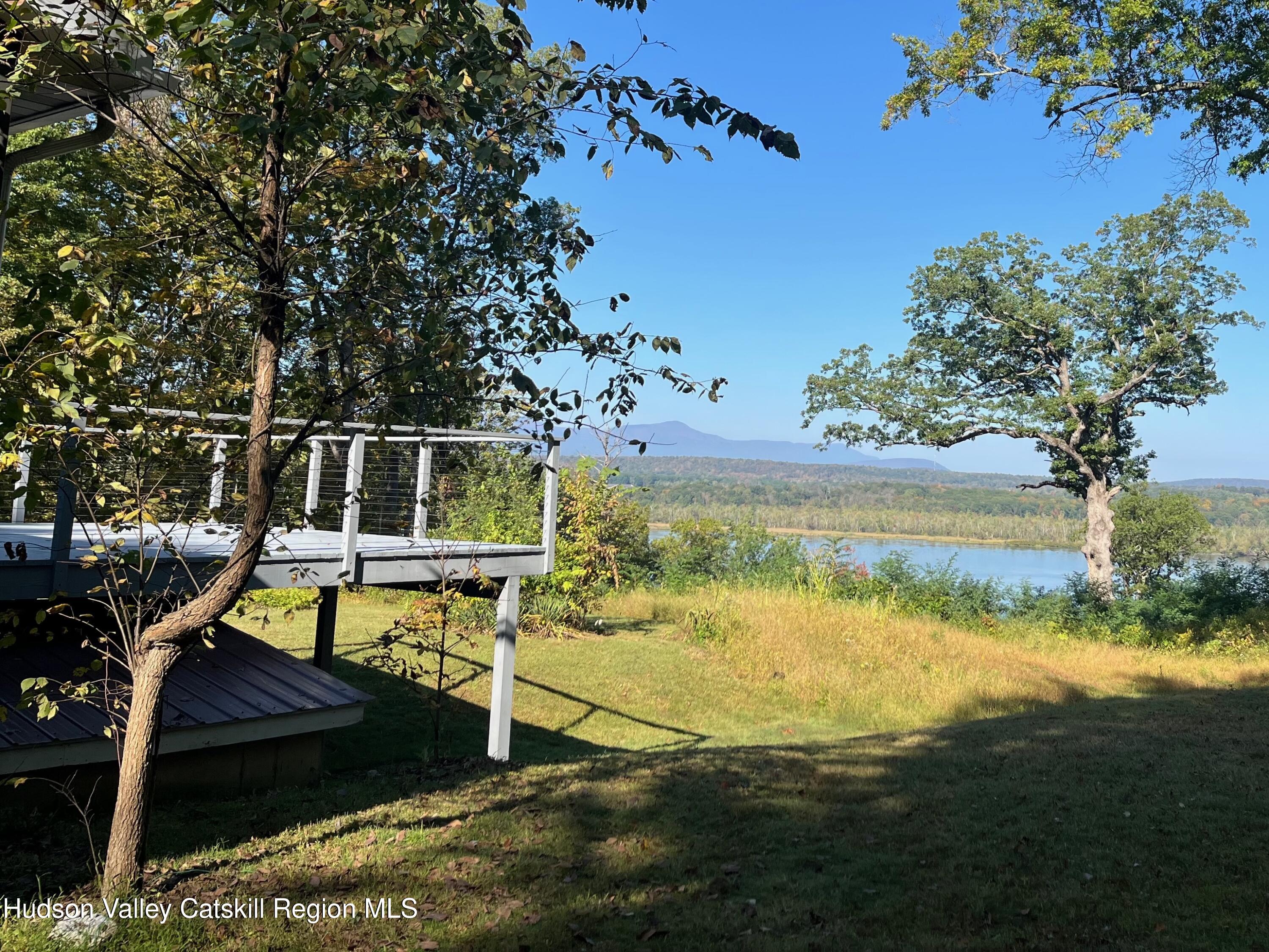 5265 County Rt 9g Germantown, NY 12526 - Photo 33 of 35 a view of a swimming pool with a lake