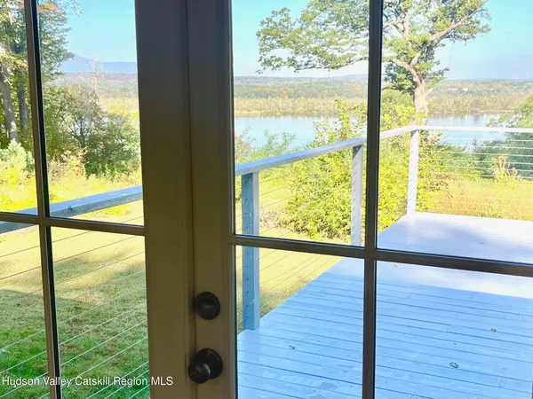 a kitchen with stainless steel appliances granite countertop a sink and a stove