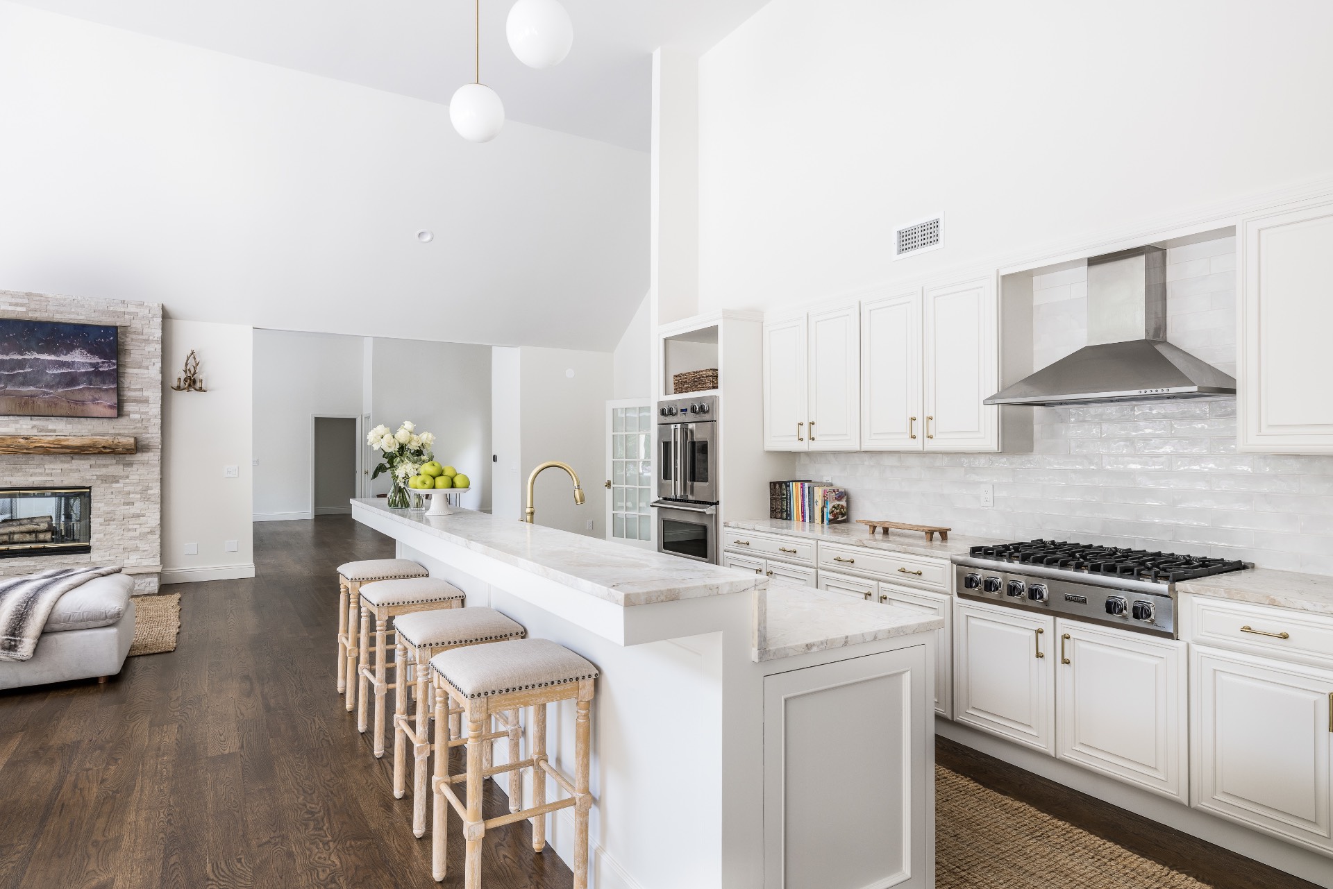 222 2 Holes Water Road East Hampton, NY 11937 - Photo 11 of 32 a kitchen that has a lot of cabinets a sink and appliances in it
