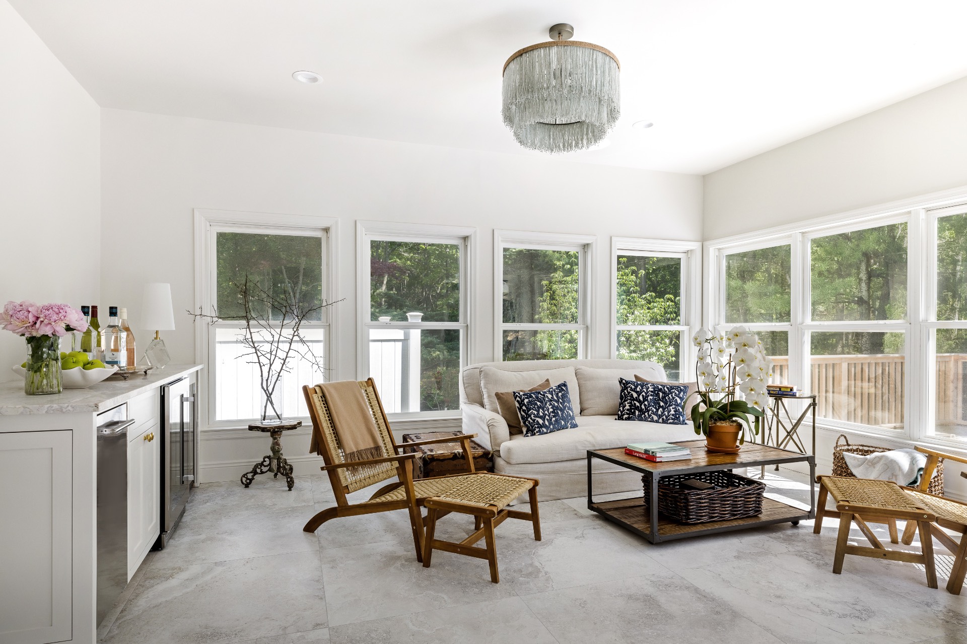222 2 Holes Water Road East Hampton, NY 11937 - Photo 14 of 32 a living room with furniture and a chandelier