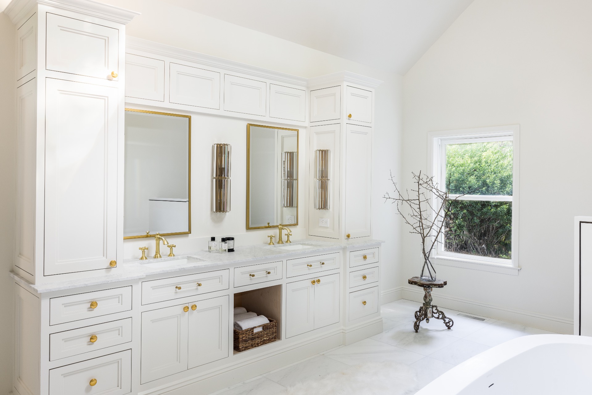 222 2 Holes Water Road East Hampton, NY 11937 - Photo 17 of 32 a bathroom with a double vanity sink a mirror and a bathtub