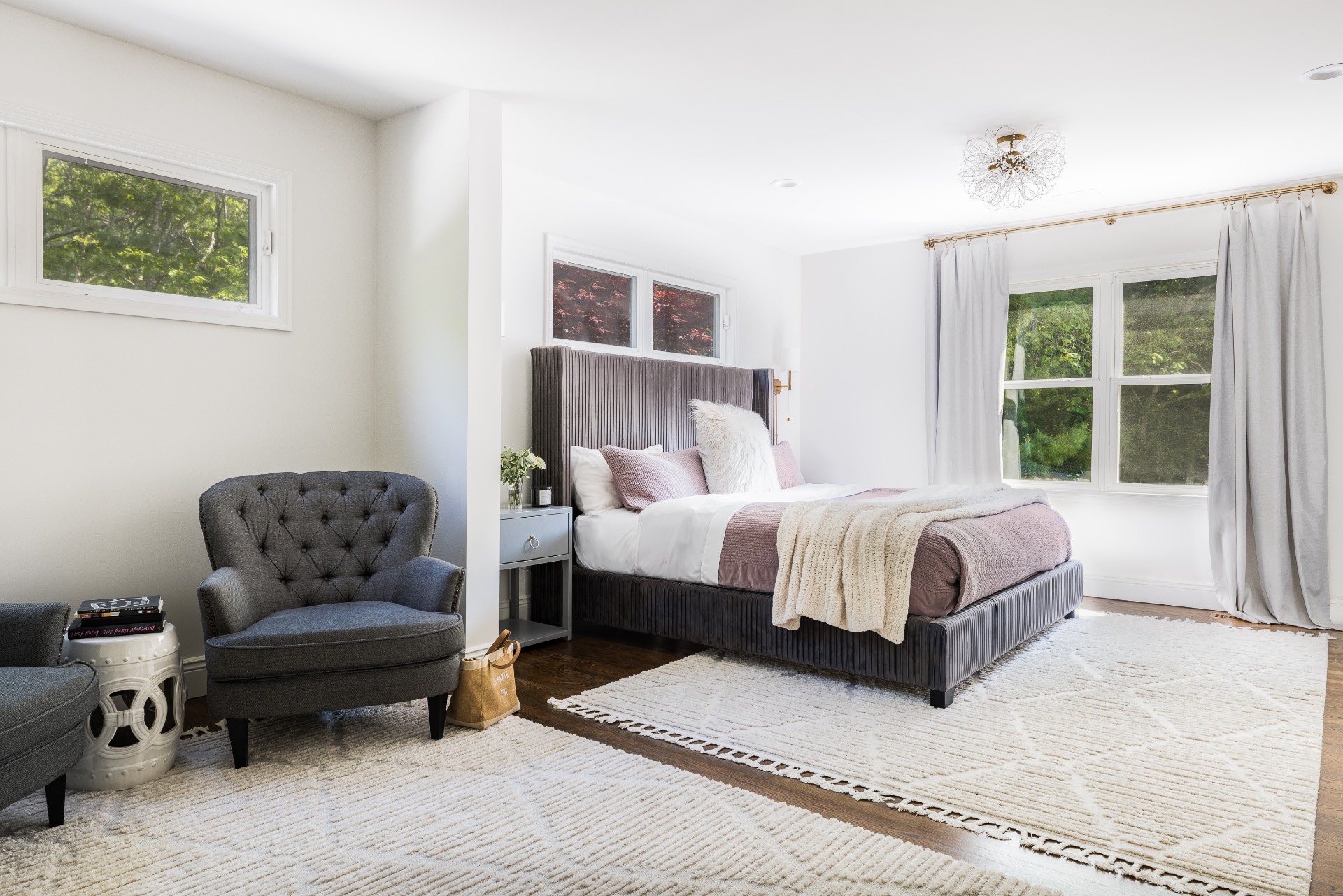 222 2 Holes Water Road East Hampton, NY 11937 - Photo 24 of 32 a bedroom with a bed and couch