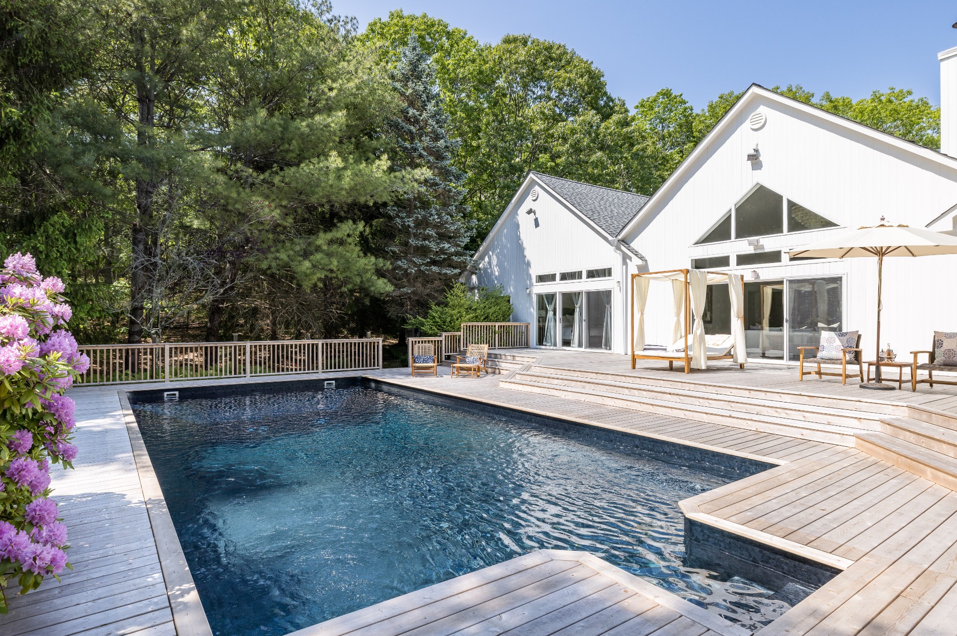 222 2 Holes Water Road East Hampton, NY 11937 - Photo 28 of 32 a view of a house with pool