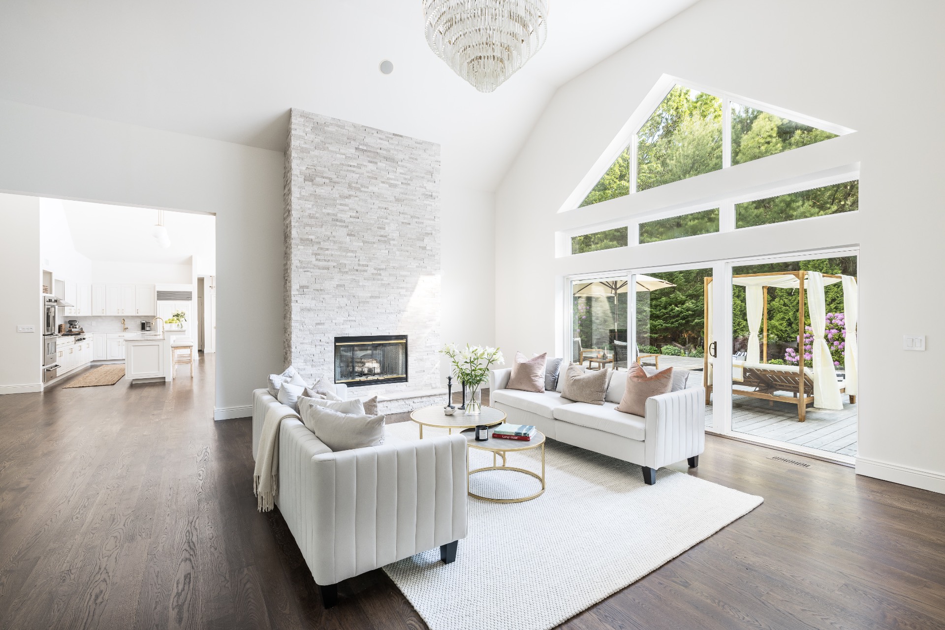 222 2 Holes Water Road East Hampton, NY 11937 - Photo 5 of 32 a living room with furniture and a large window