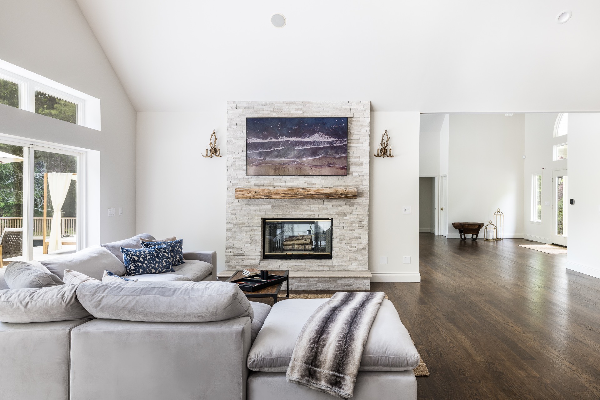 222 2 Holes Water Road East Hampton, NY 11937 - Photo 10 of 32 a living room with furniture and a fireplace