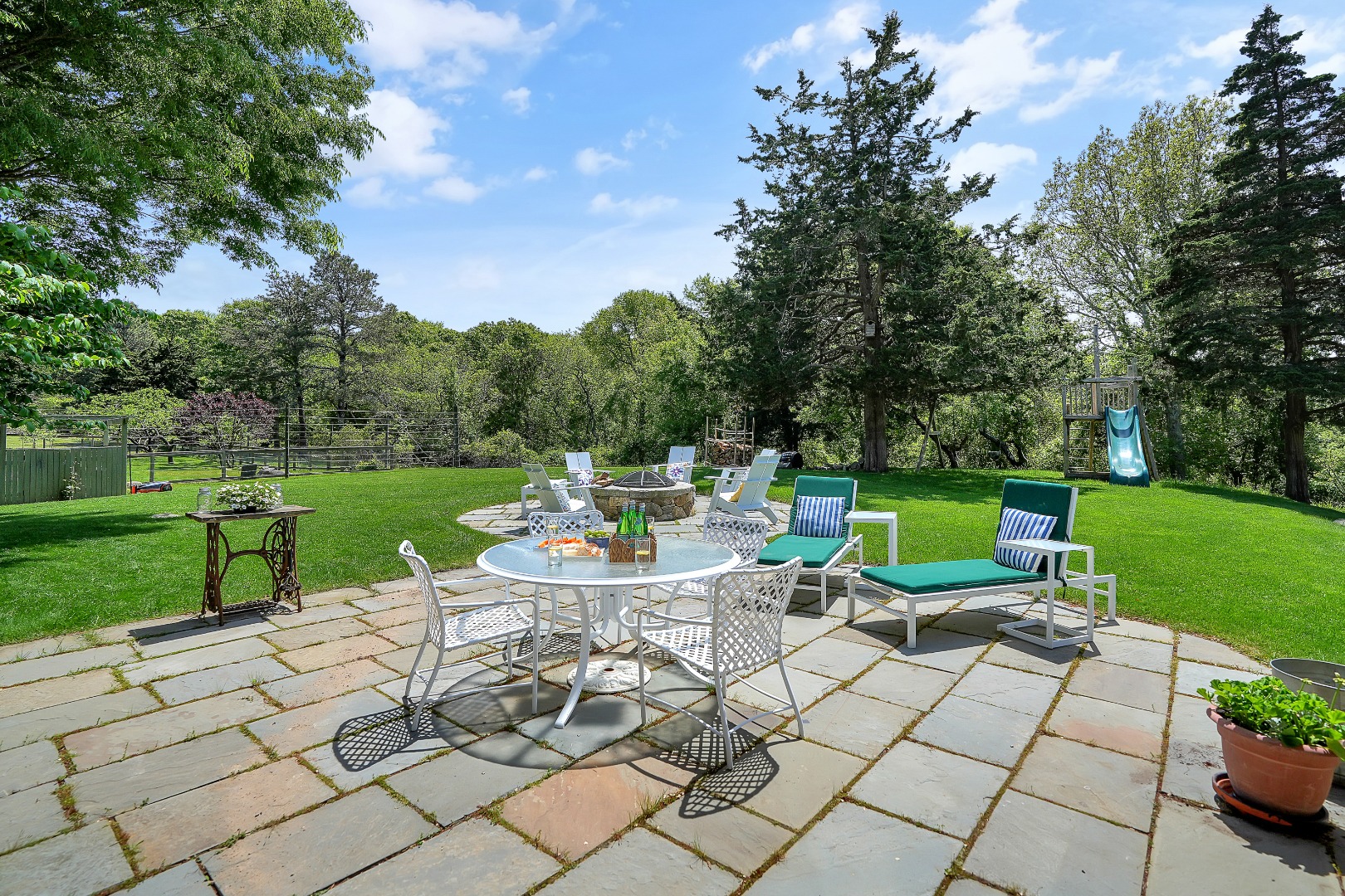 122 Old Farm Road Chilmark, MA 02535 - Photo 9 of 36 a view of a backyard with sitting area