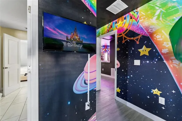 a bedroom with furniture and a small pool