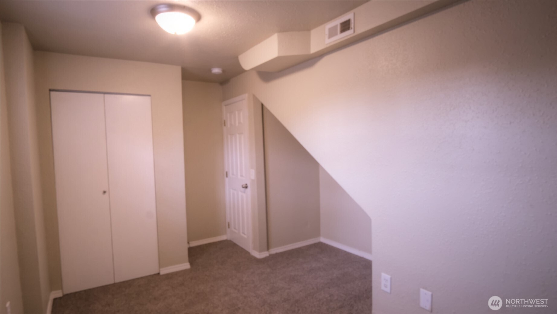 6605 South 127th Place Seattle, WA 98178 - Photo 22 of 28 a view of hallway with stairs