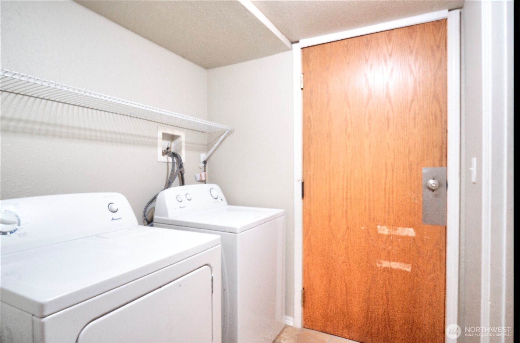 6605 South 127th Place Seattle, WA 98178 - Photo 24 of 28 a utility room with dryer and washer